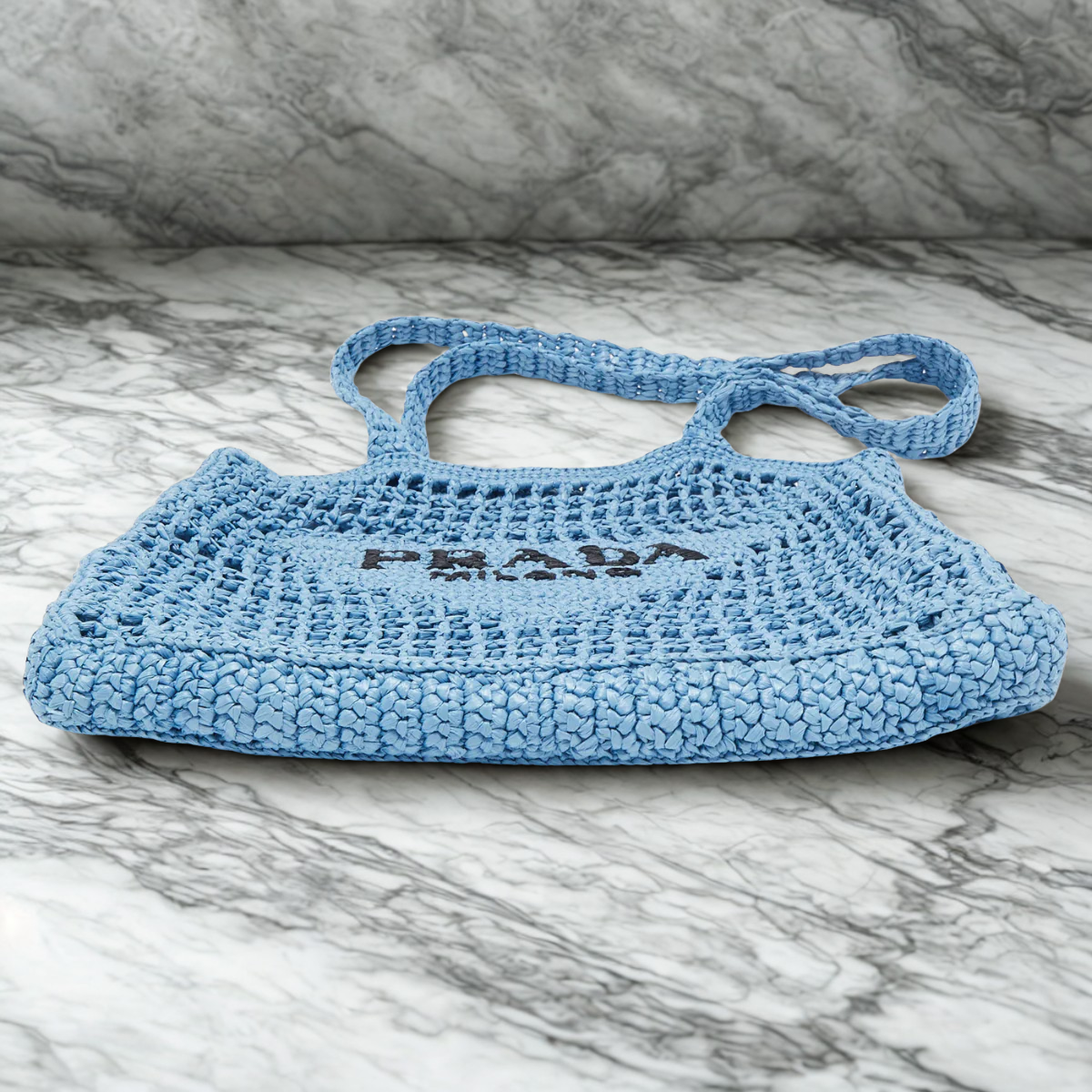 PRADA SHOPPER BAG IN RAFFIA WITH WOVEN LOGO – BLUE